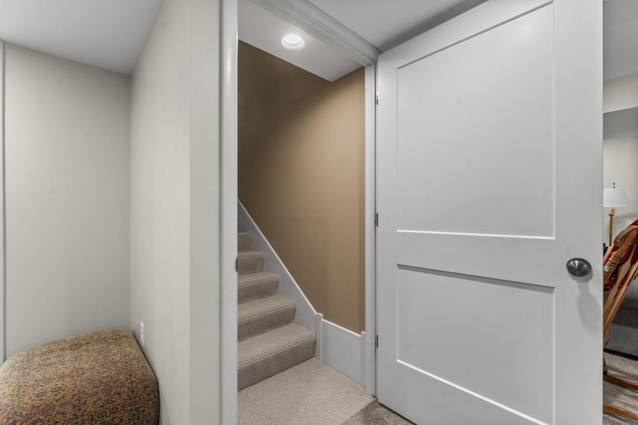 Wide stairway down to the basement.