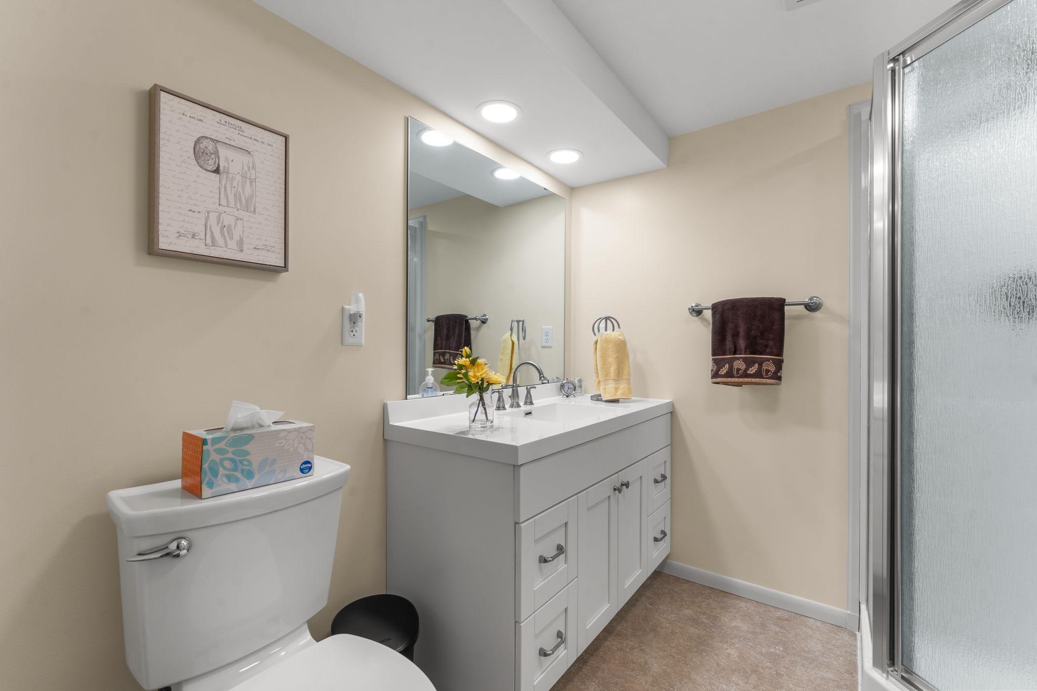 Third bathroom is a three quarter bath in the basement.