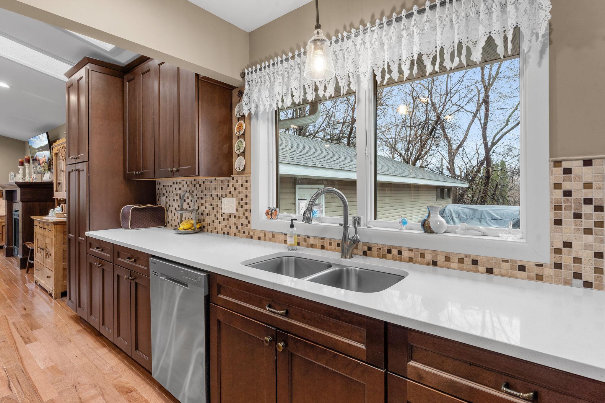 A wonderful view of the backyard gardens while doing dishes.
