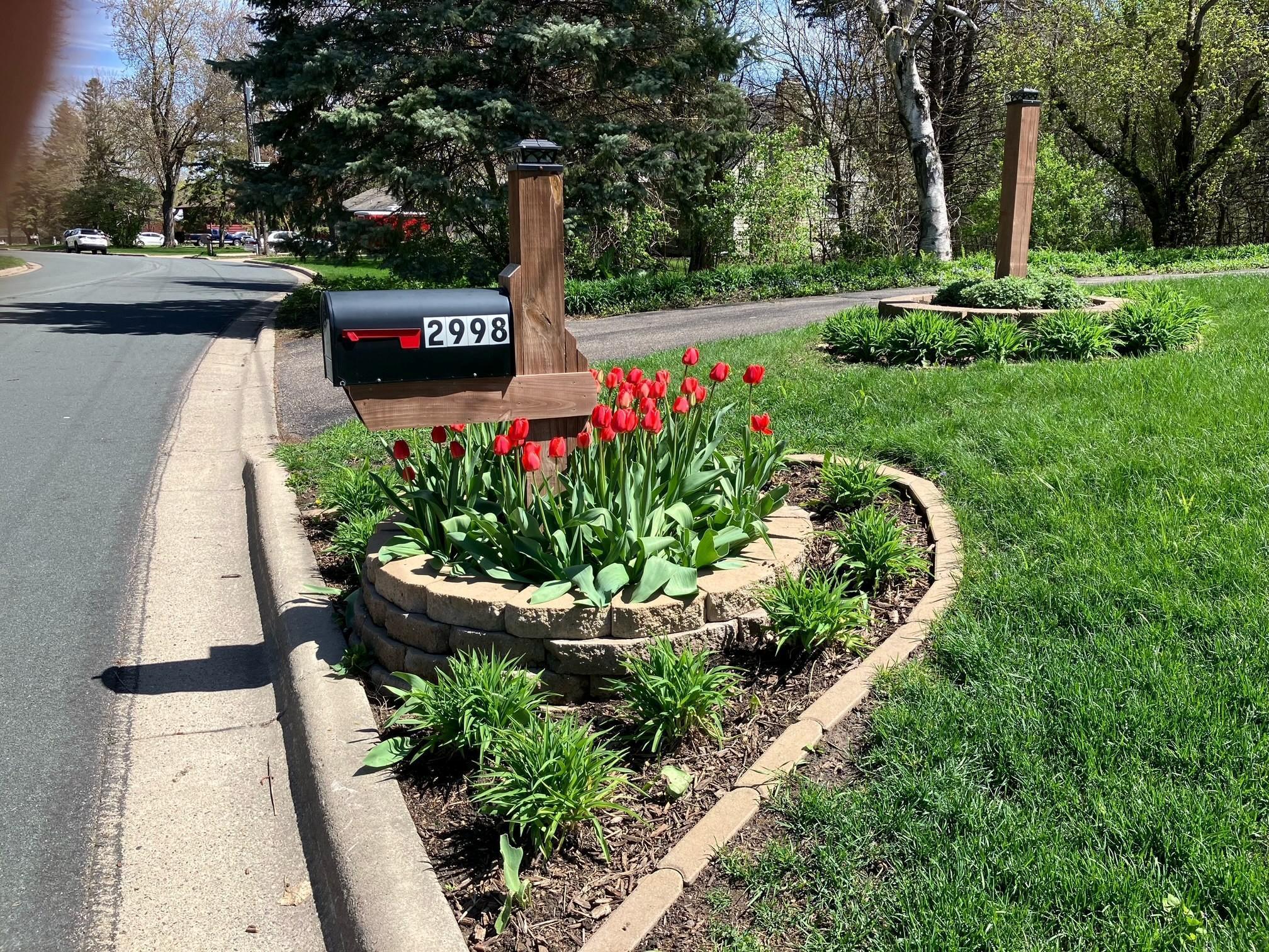 The mailbox is another area thoughtfully landscaped.