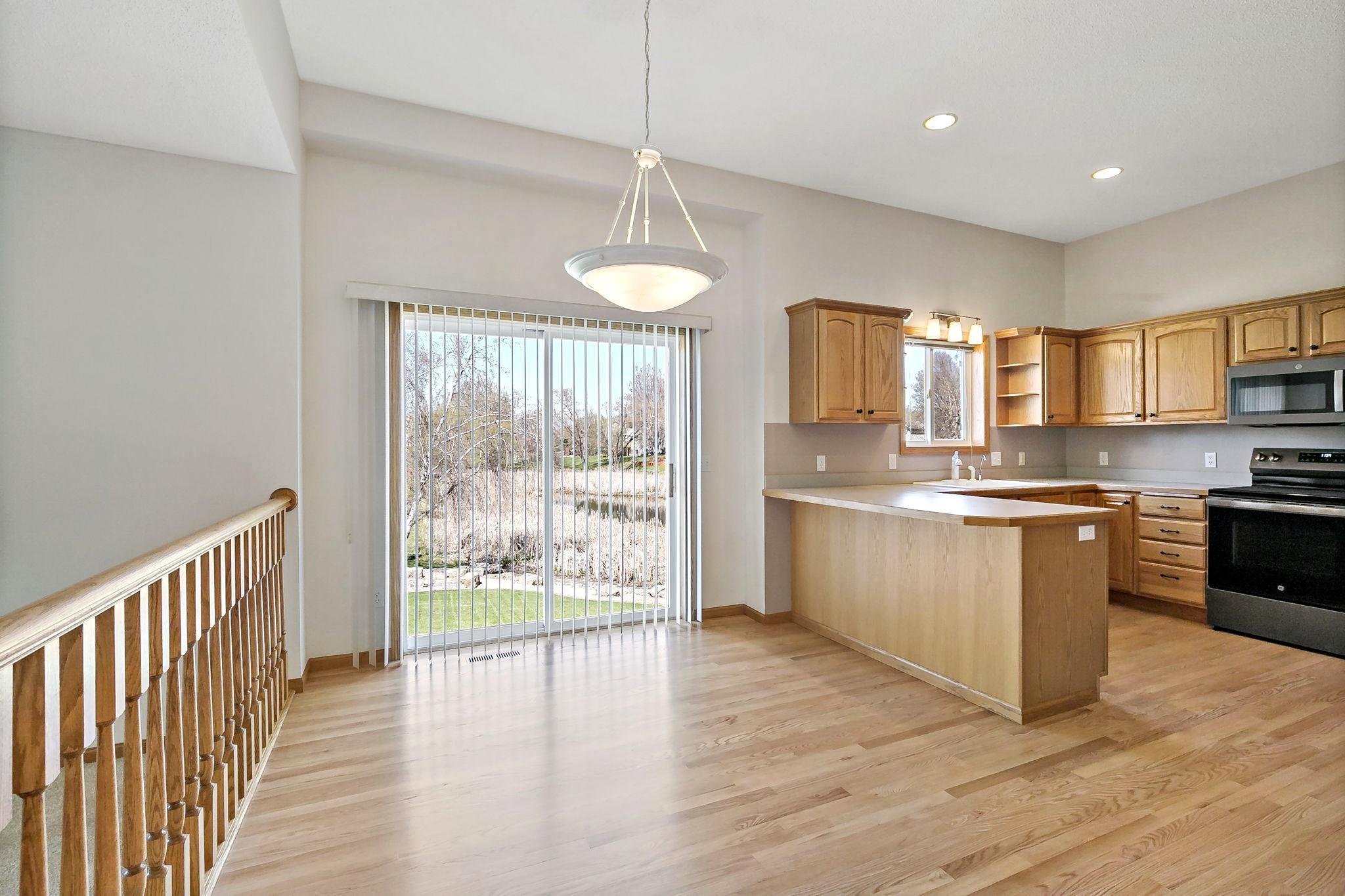 Beautiful refinished hardwood flooring in the Dining Room, Kitchen & Entry