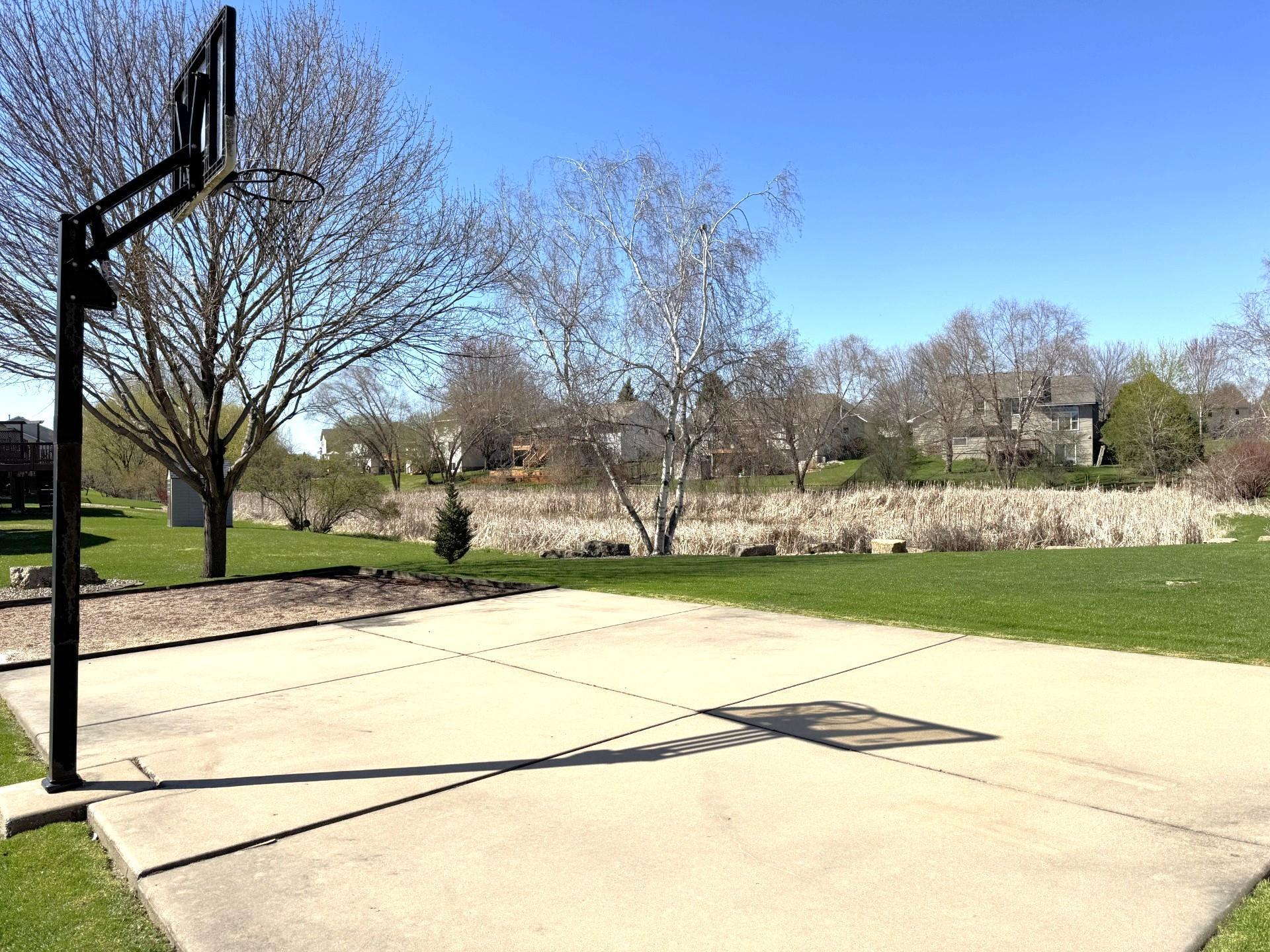 Larger 28' x 19' Cement Patio/Sport court. Note the basketball pole can be placed in two separate areas at the edge of the patio