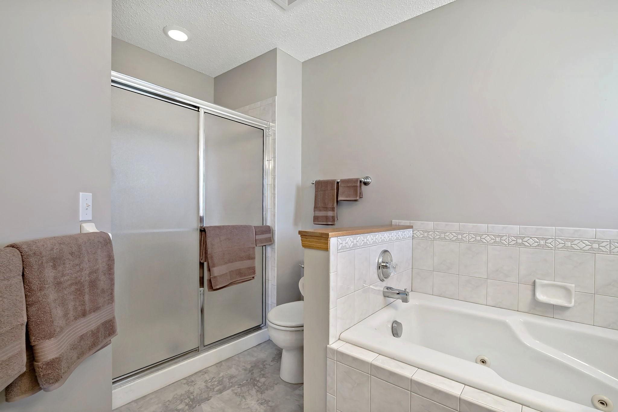 ... with a separate jetted tub & shower