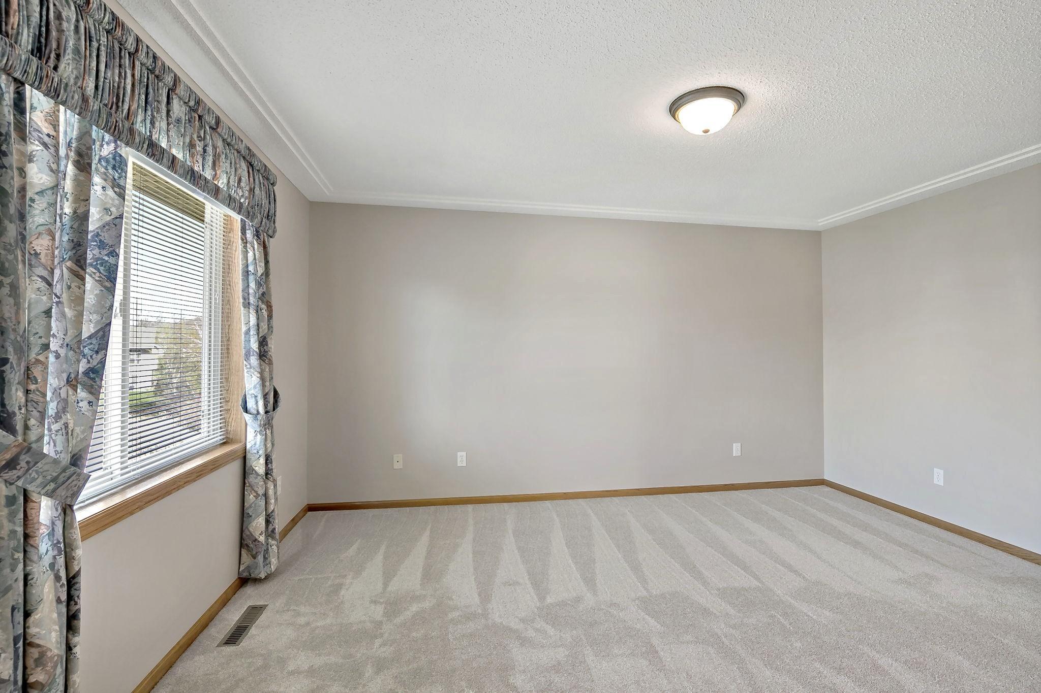 15'x 12' Primary Bedroom; with a private full Bathroom & walk-in closet