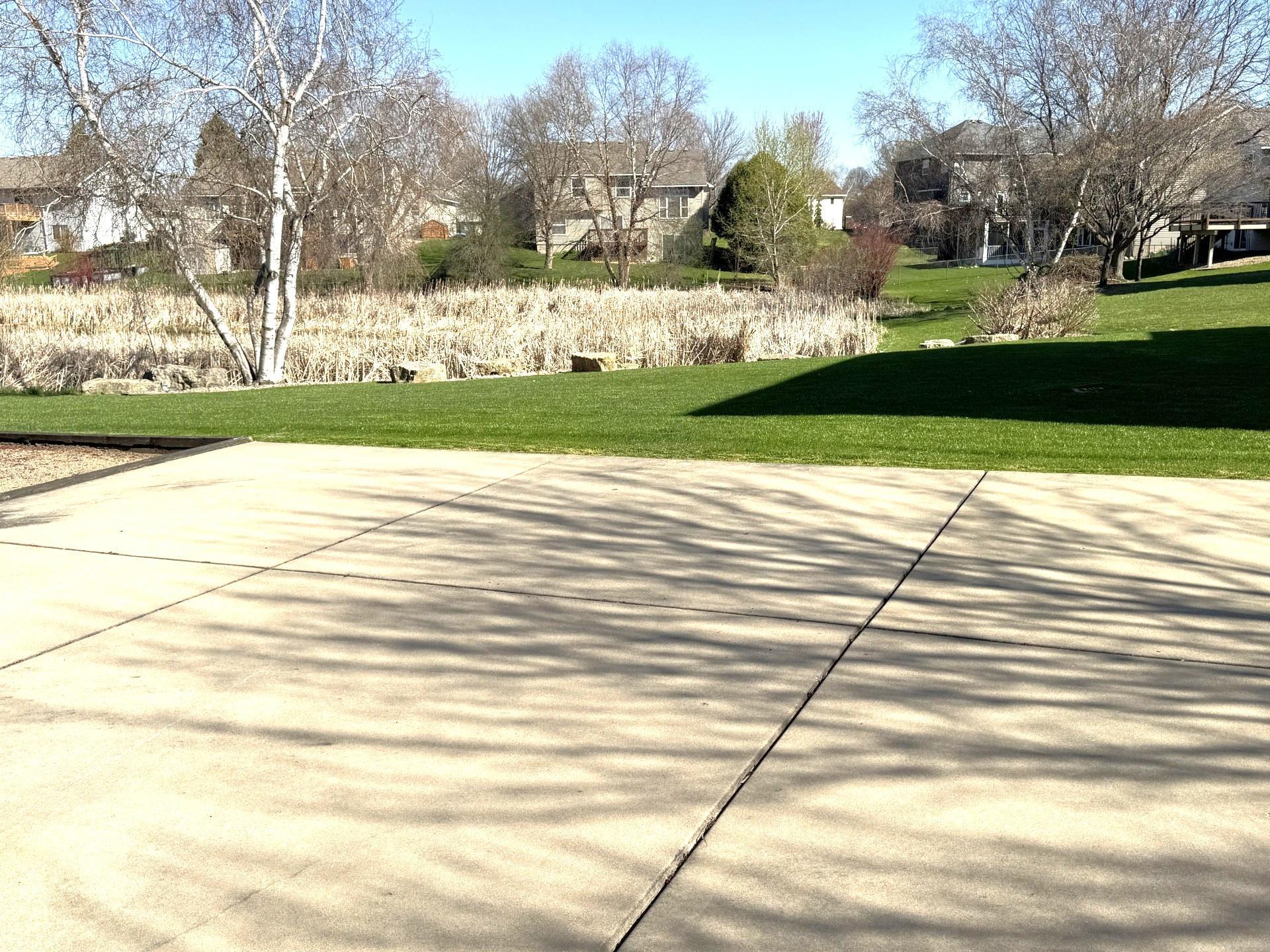 Patio/Sport court & useable back yard grass area