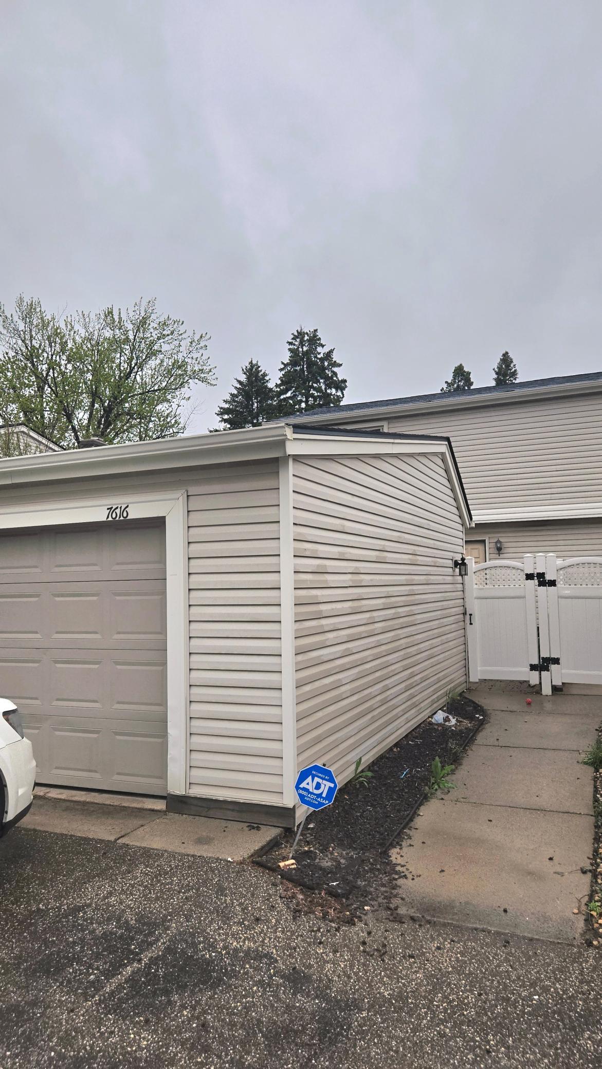 Oversized 2 car garage and gate to the front patio