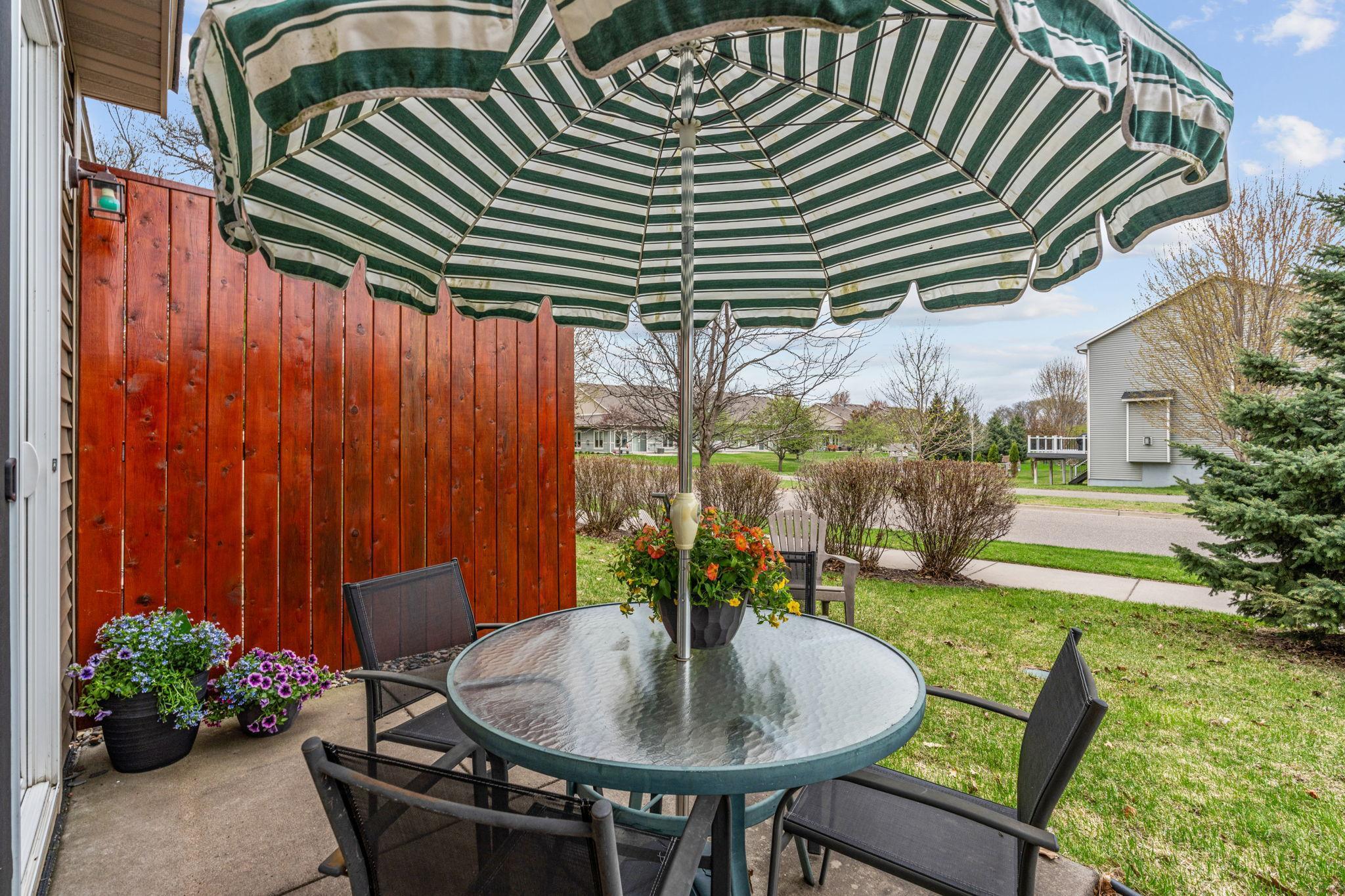 Faces a quiet neighborhood road with homes