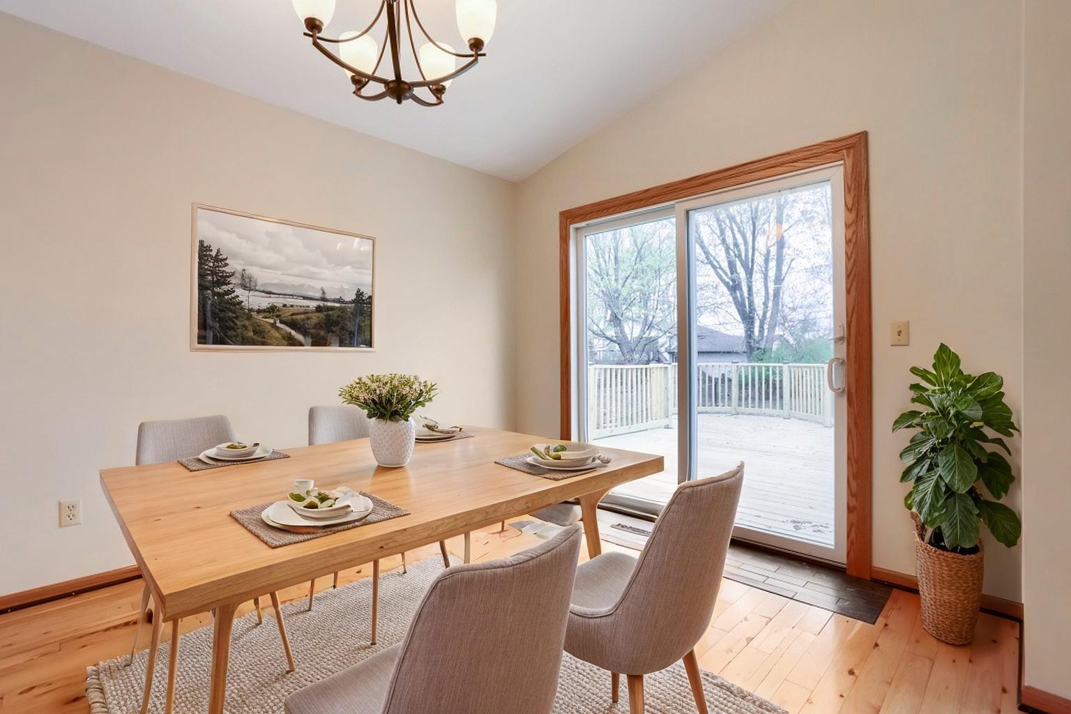 Dining room with patio door leading to the deck