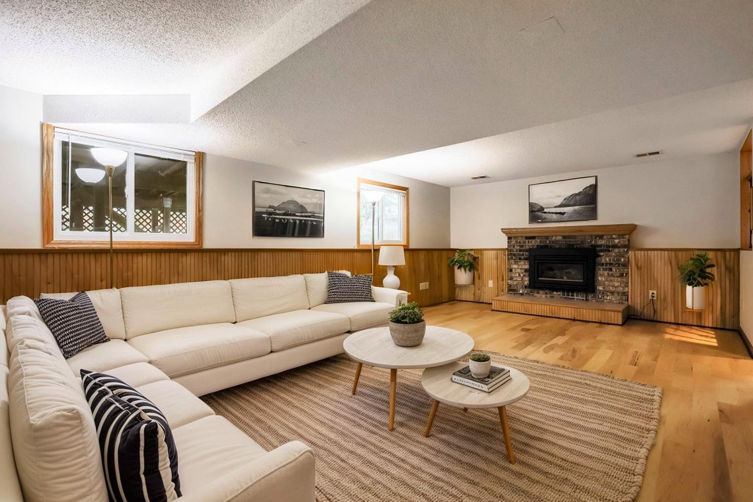 Lower level family room with cozy fireplace