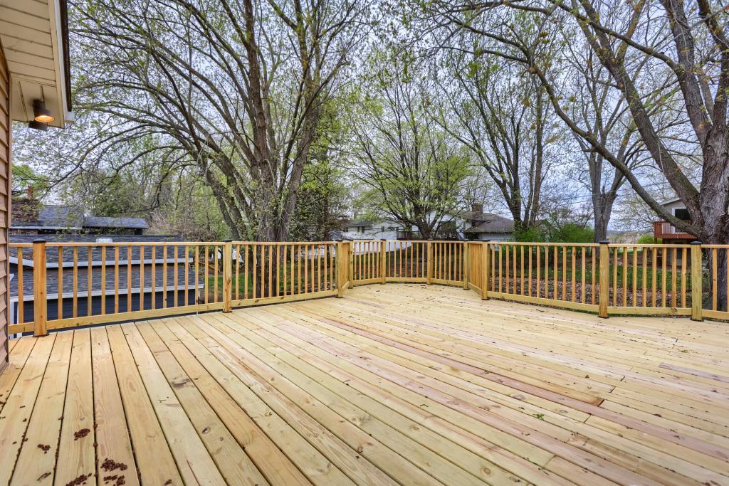 Brand new oversized deck overlooking the backyard