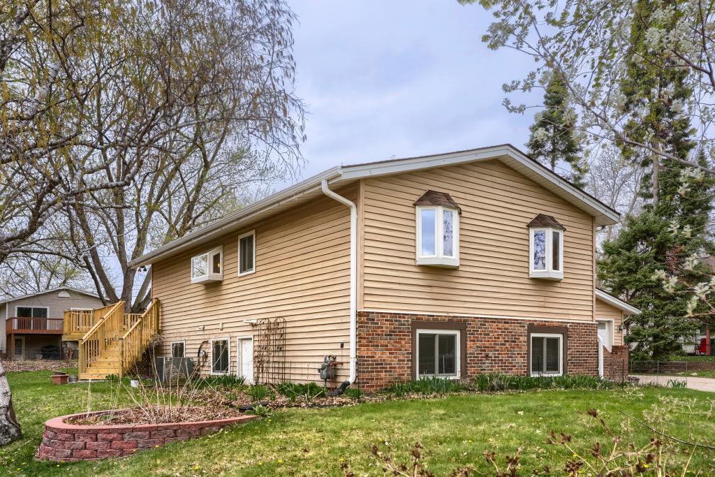 Beautifully landscaped yard with mature gardens