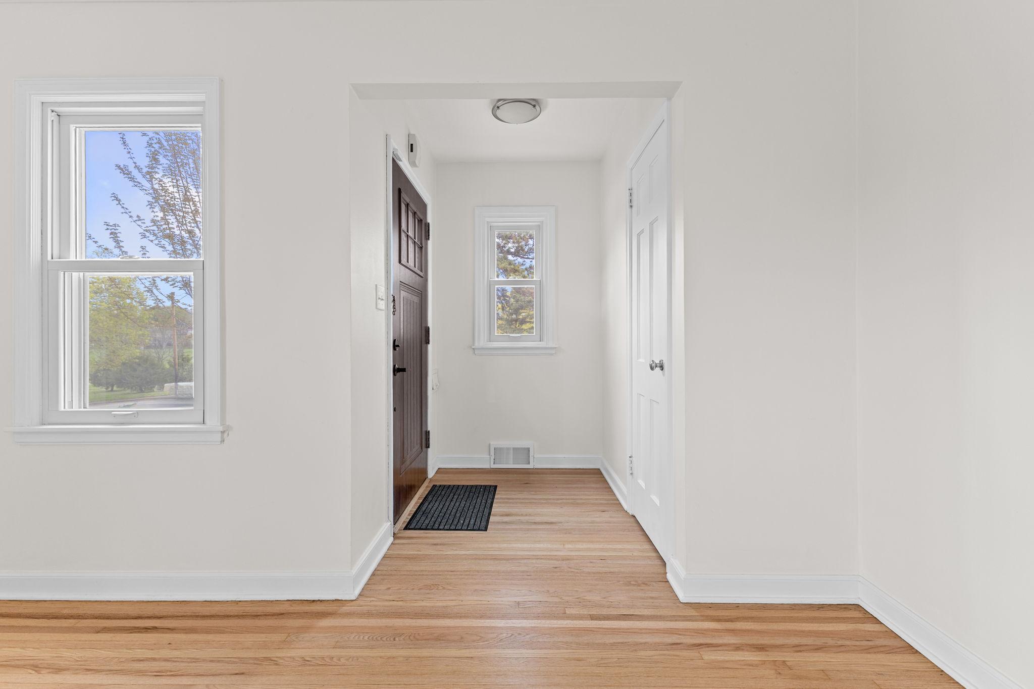 Welcome guests into the entryway and living room with an easy, natural flow throughout the main level.