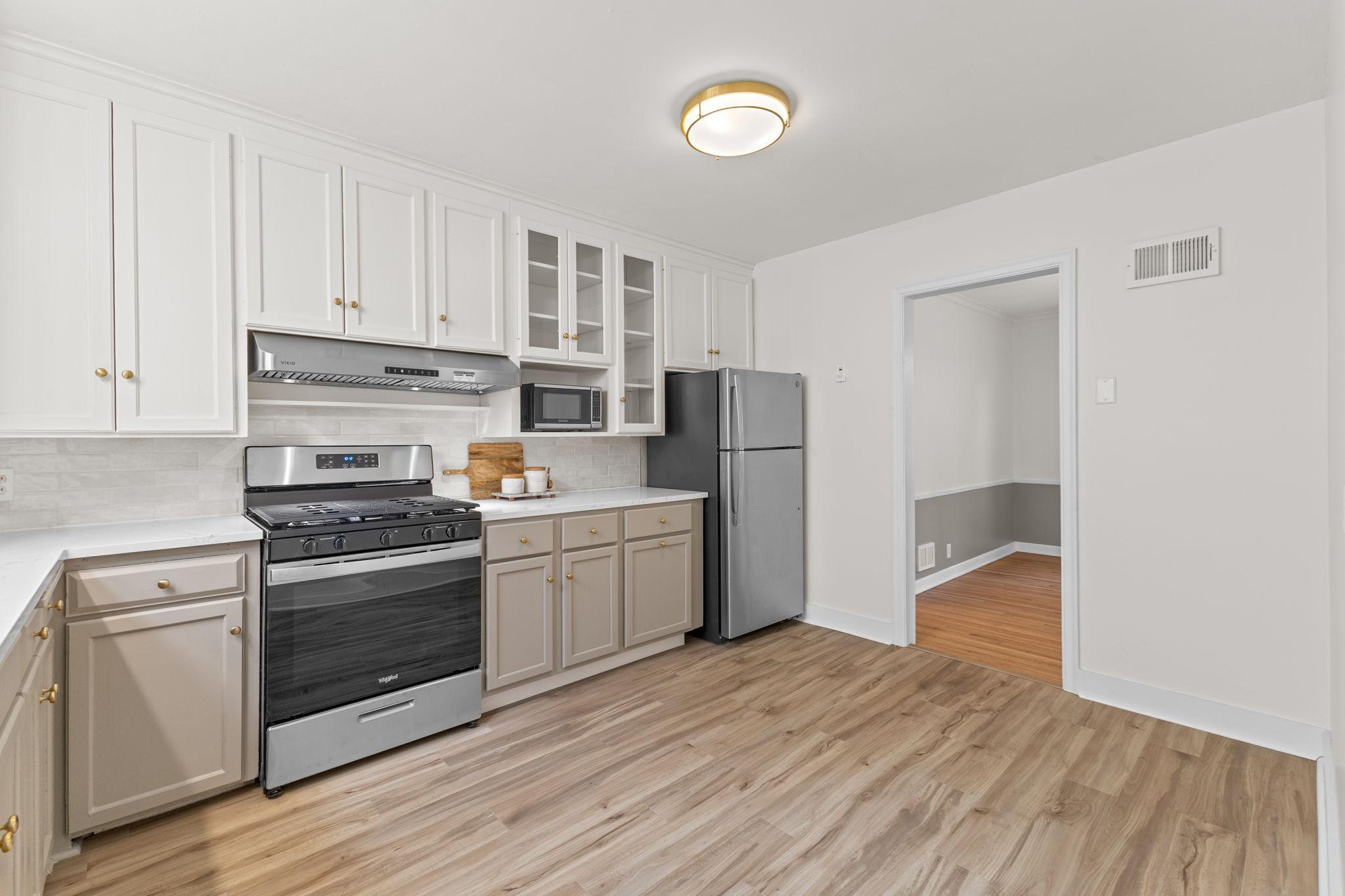 Stainless steel appliances create a clean, cohesive look that is easy to maintain.