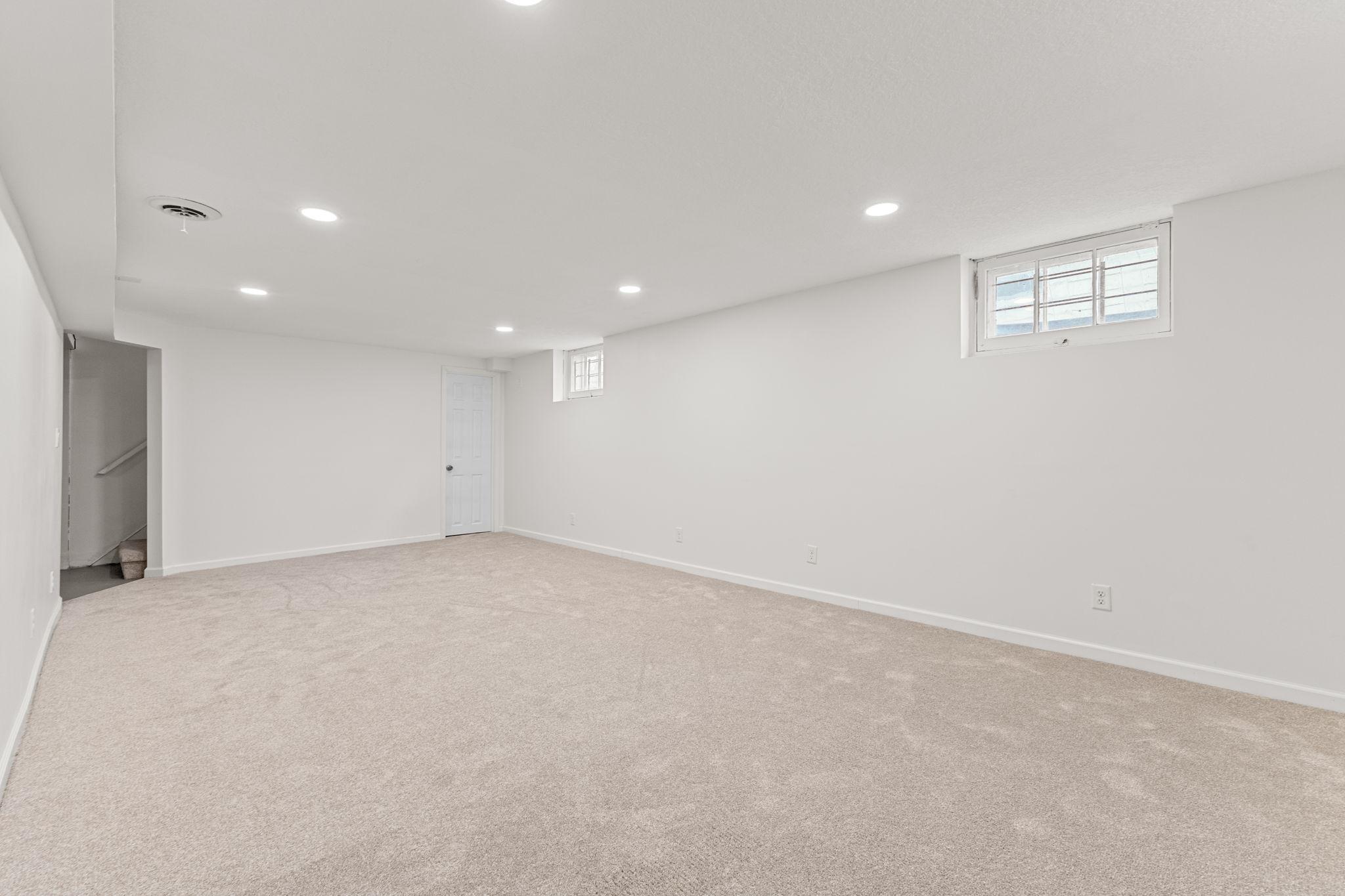 Recessed lighting ensure this lower level is bright and inviting!