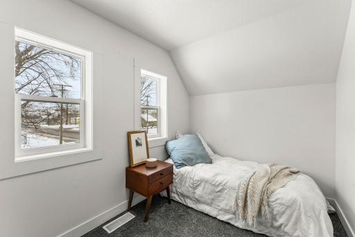 Two additional bedrooms offer great natural light, plenty of closet space and soft carpeting.
