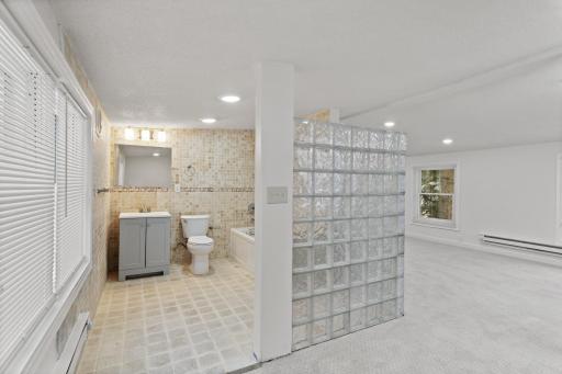 Upper level full bathroom with a new vanity