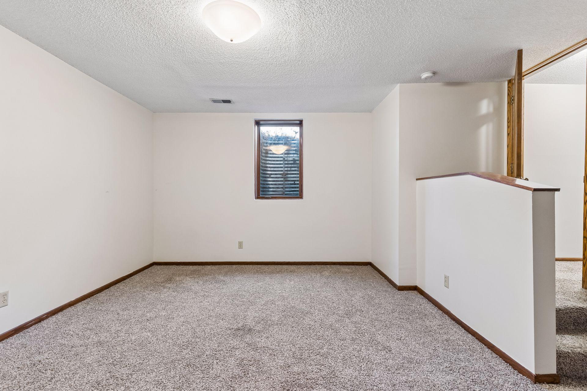 Lower Level Family Room / 3rd Bedroom_2122 East 22nd Street