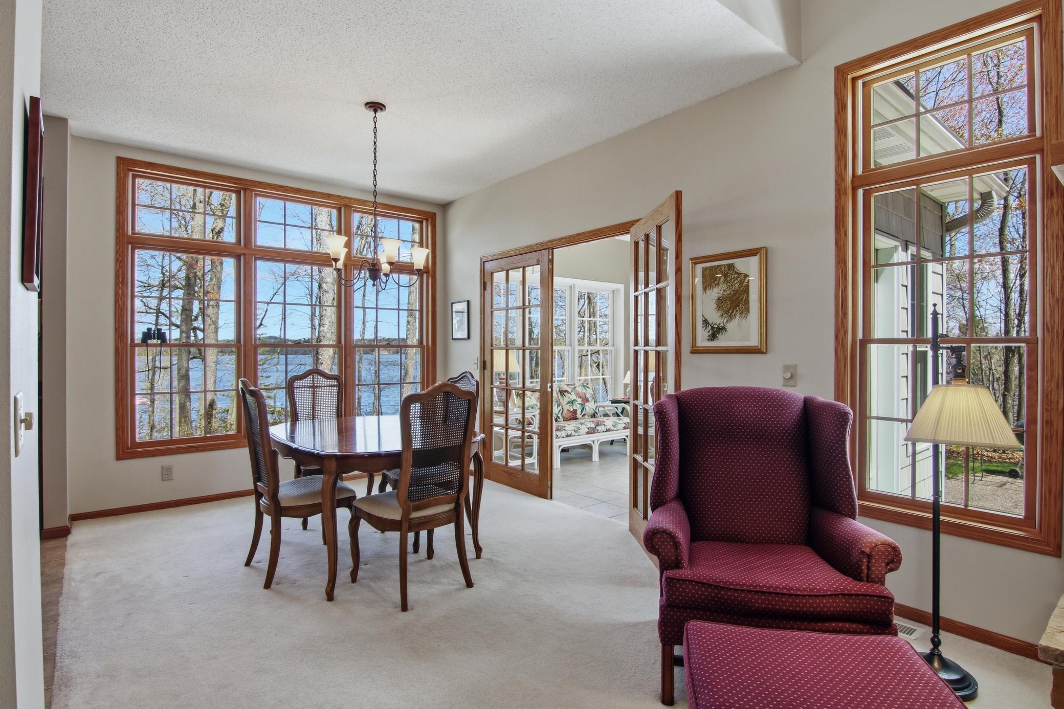 The dining space opens to a stunning sunroom! Quality woodwork and finishing throughout!