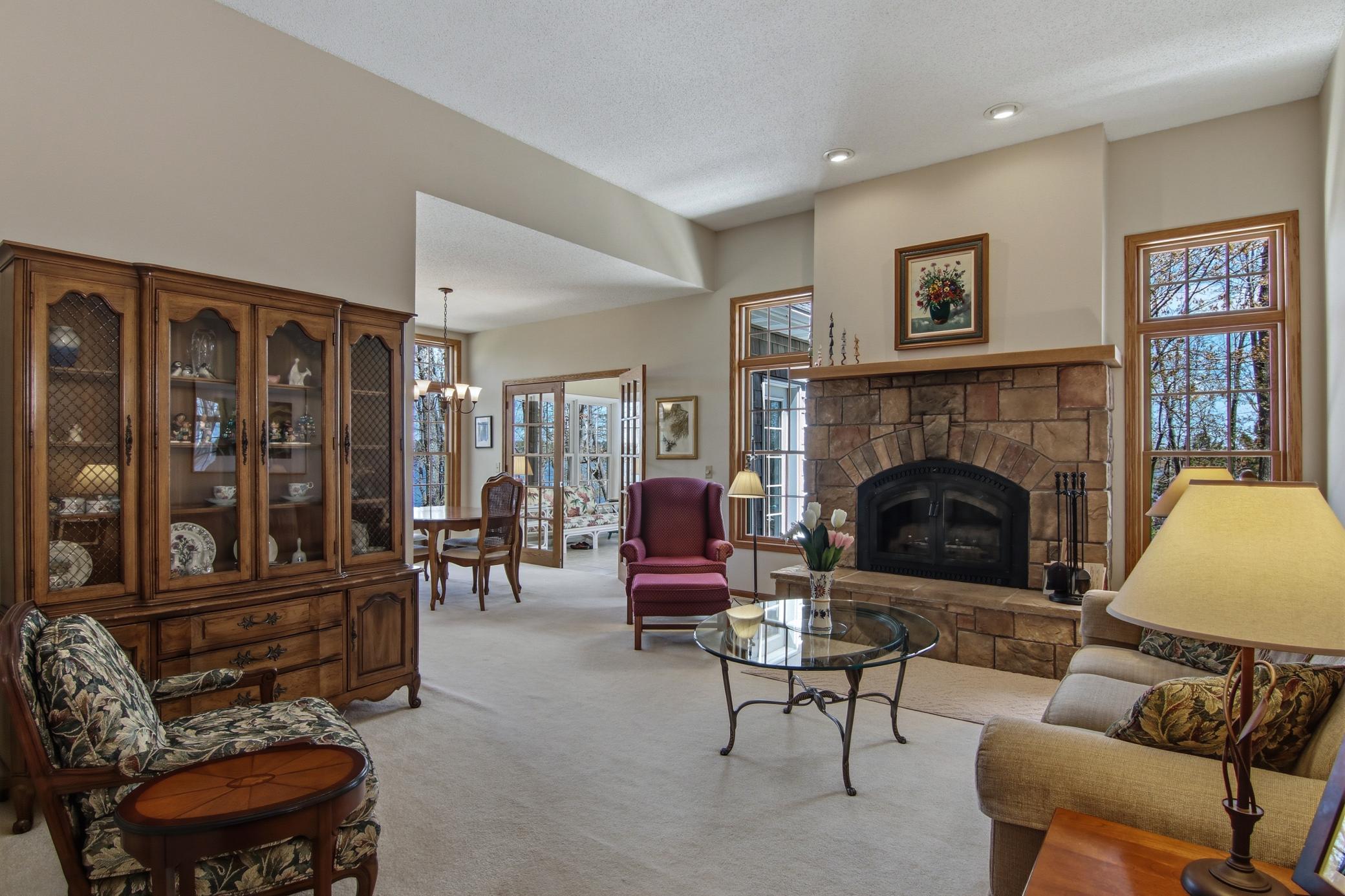 Nice stone woodburning fireplace in the living room!