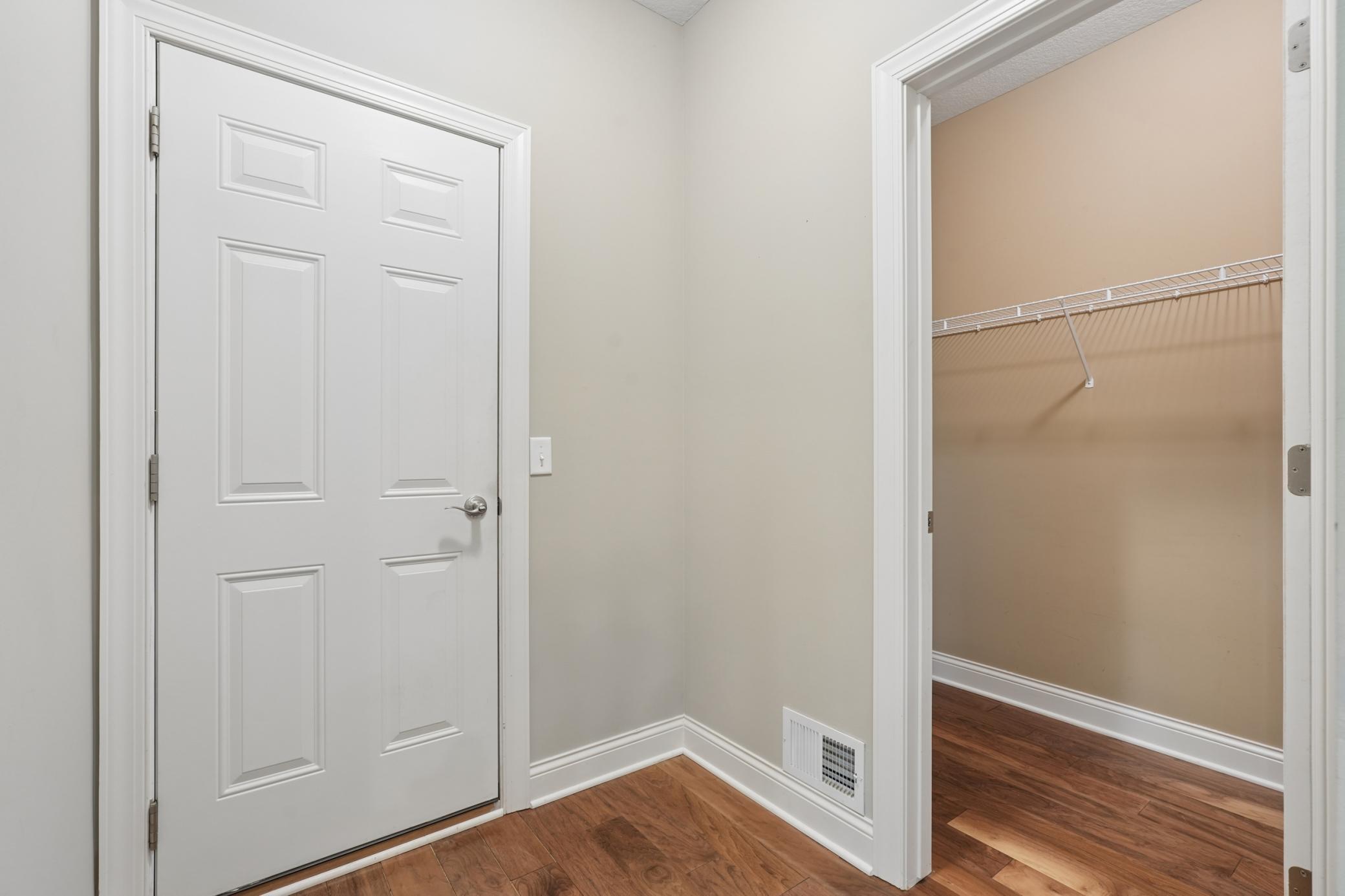 Back hall entry has walk-in closet