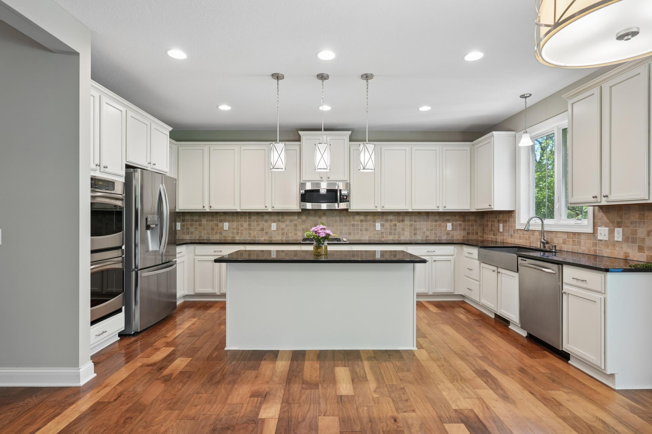 Kitchen has large center island.