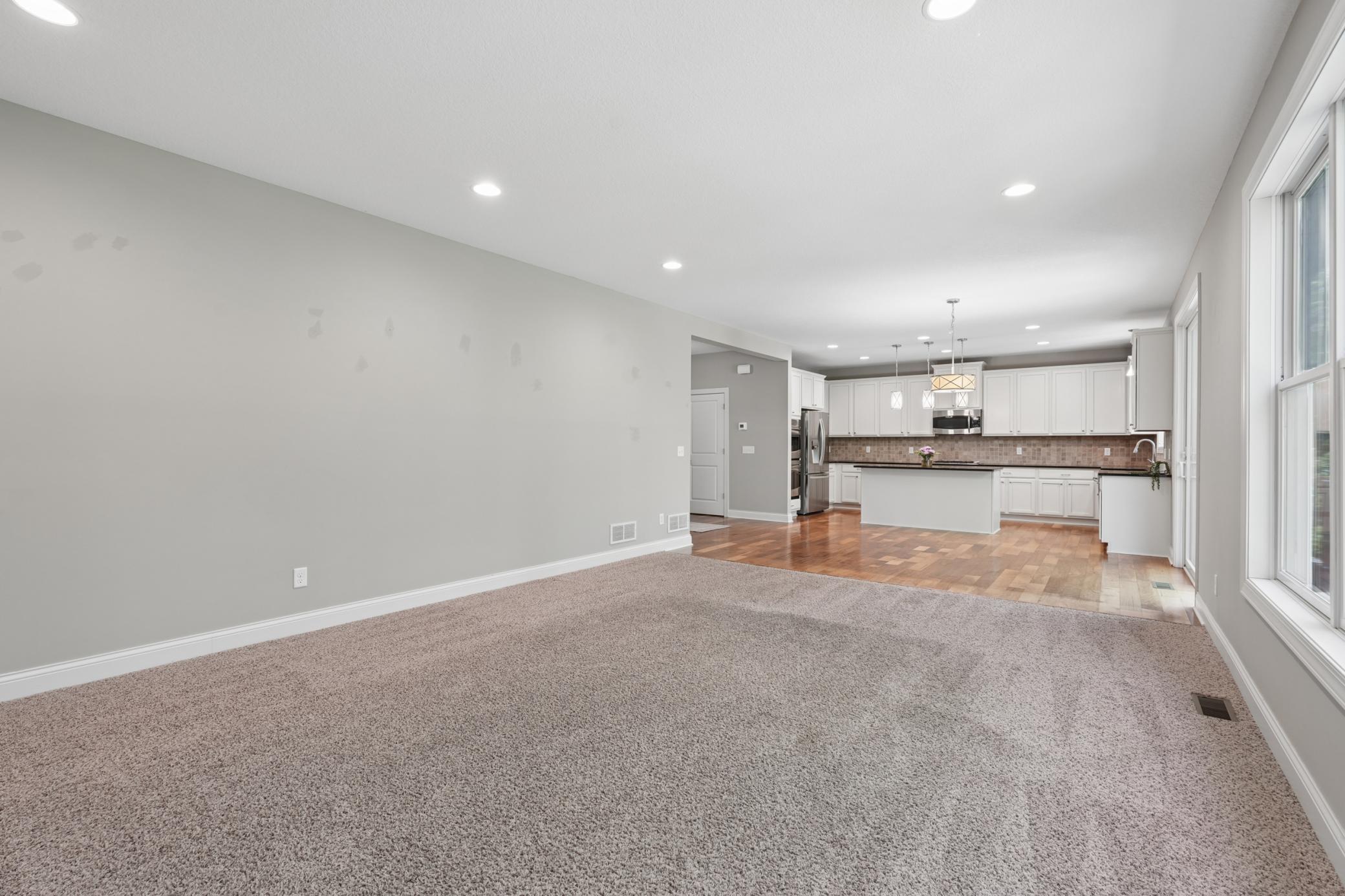 Open flow from family room to kitchen and dining.