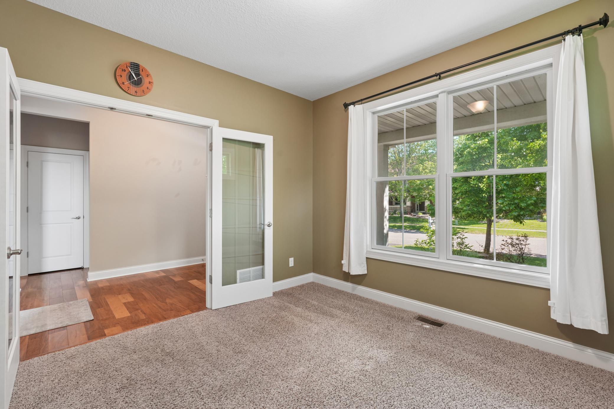 Office with glass french doors.