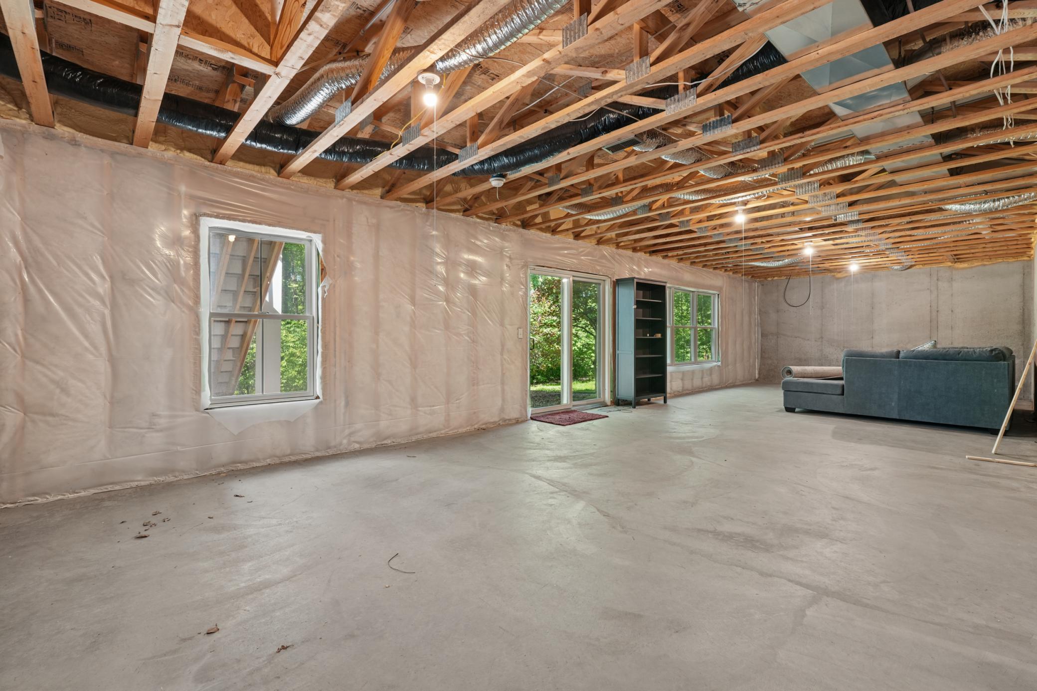 Lower level with walkout with space for bedroom and rec room.