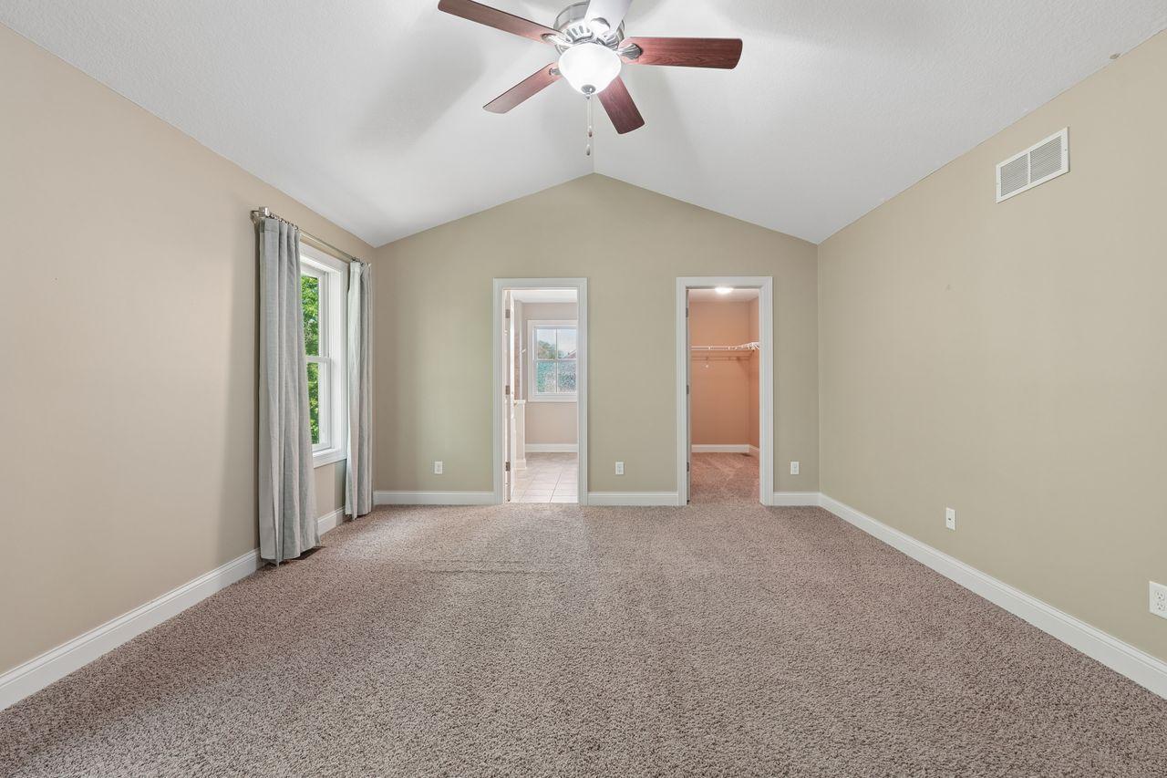 Bedroom 4 Primary with vaulted ceiling