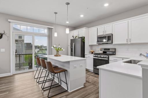 Kitchen is the best! Perfect place to entertain, chill, and have a morning cup of coffee with the sunrise.