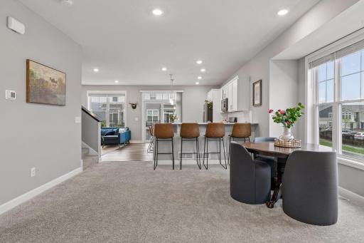 Open floor plan makes entertaining easy, and allows for tons of natural light to pour into every space.