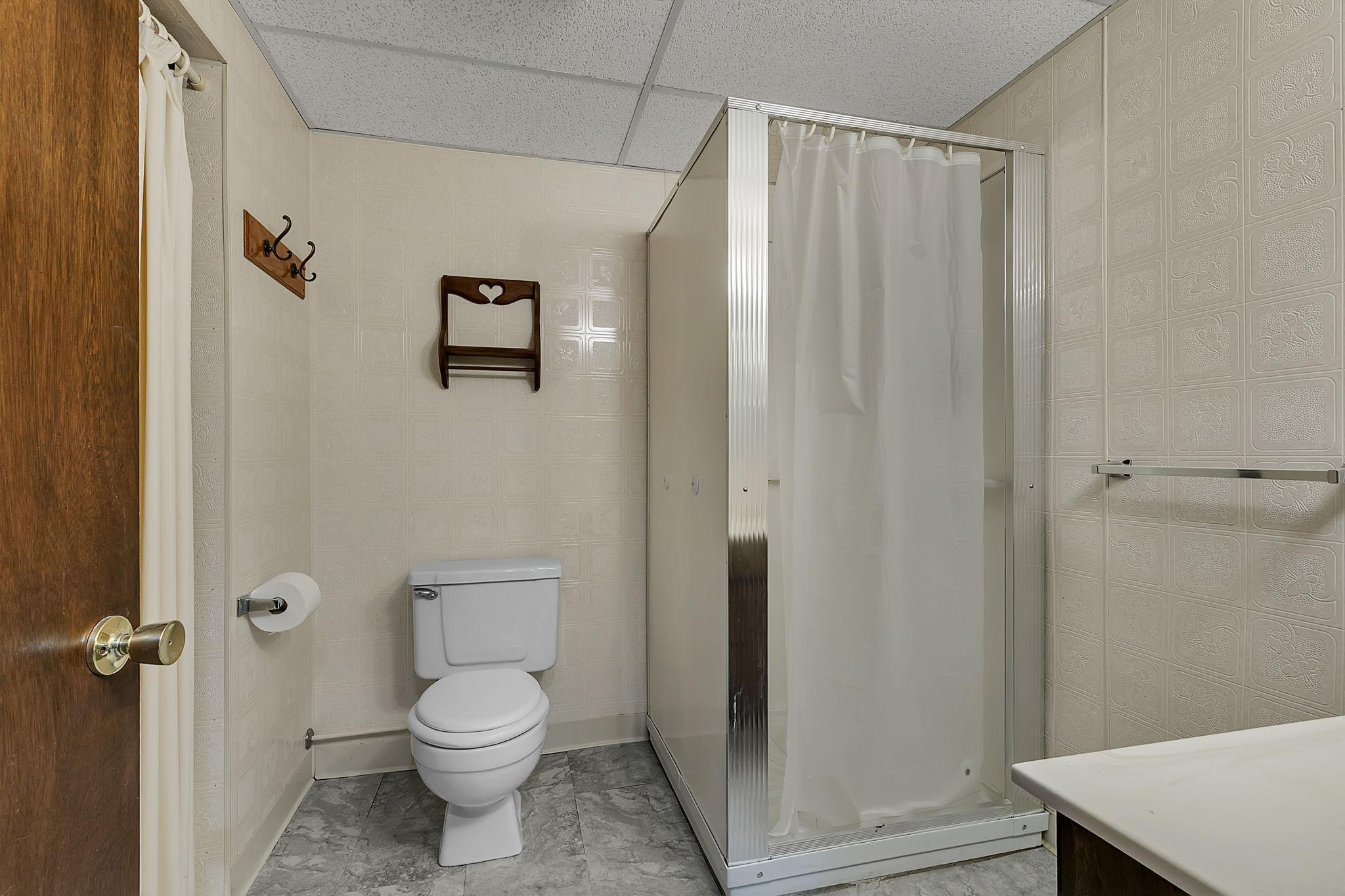 3/4 Bath in lower level with new flooring