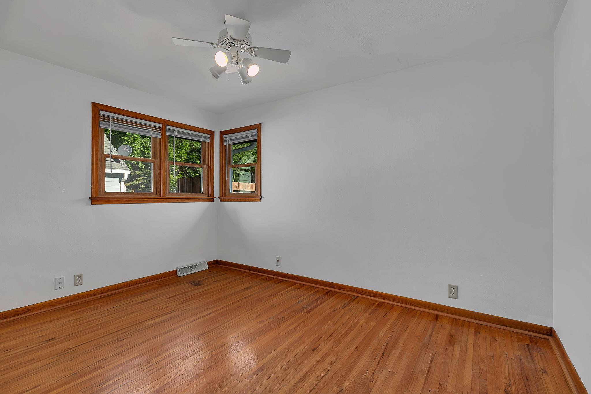 Bedroom 1 with hardwood floors