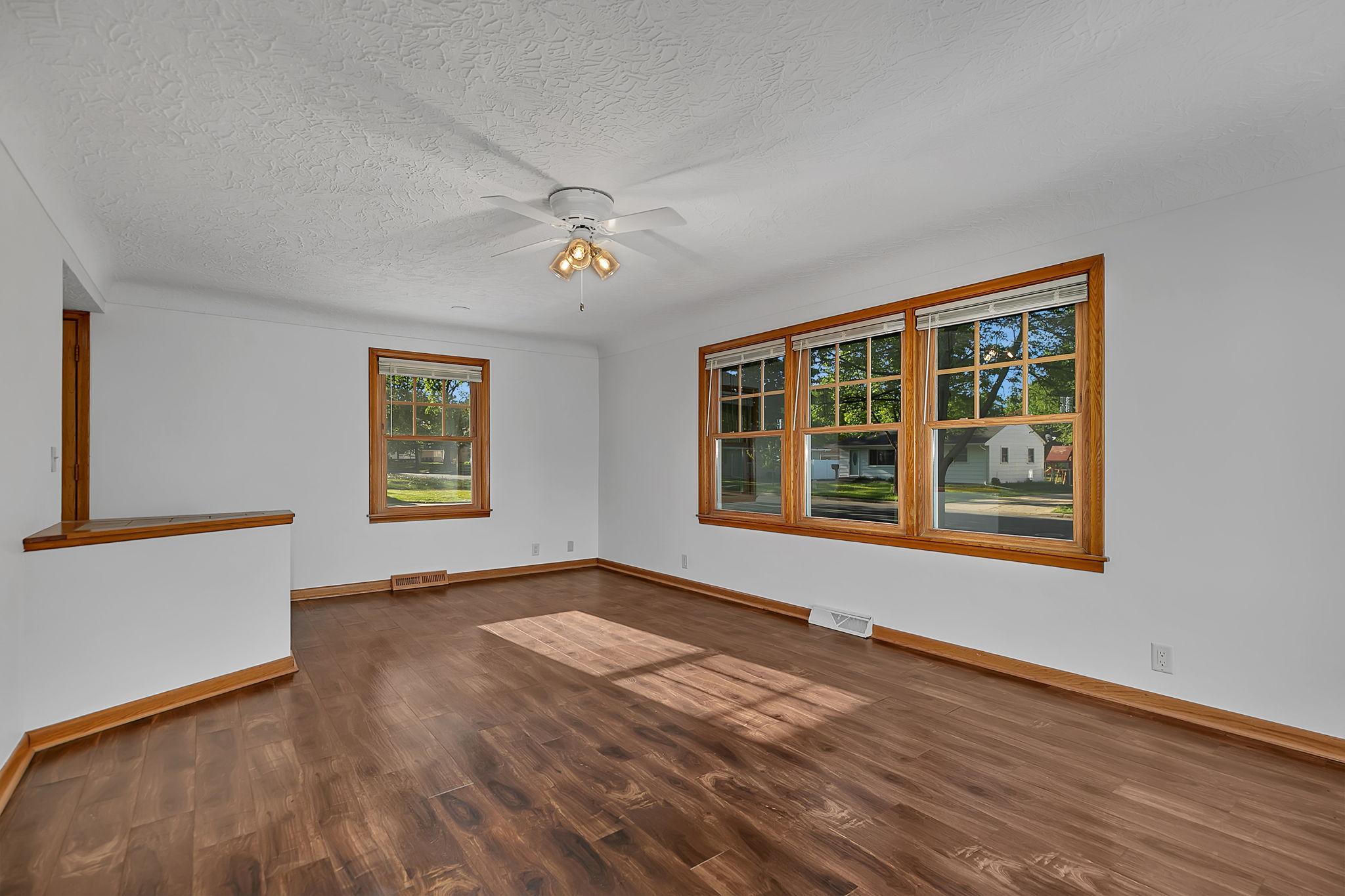 Living room with beautiful wood flooring
