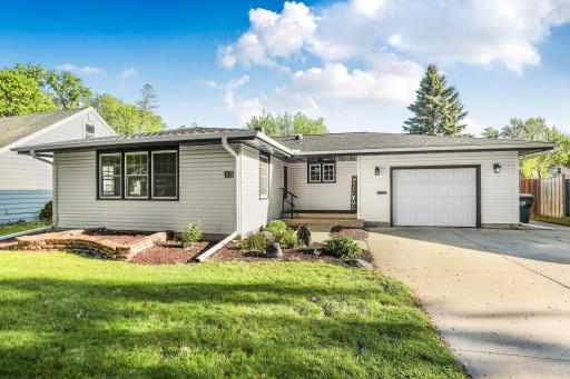Beautiful updated exterior finishes, a welcoming front entry, attached garage, with fenced in back yard