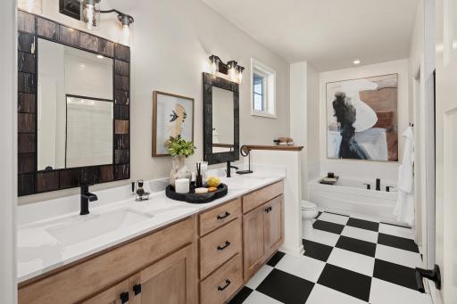 A clean, well-laid-out bathroom that keeps mornings moving and nights winding down smoothly- *Photo of model home, design selections may vary