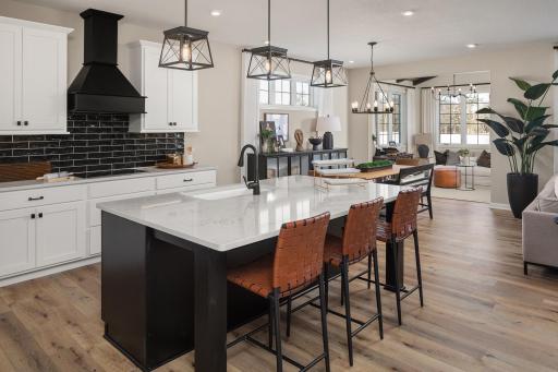 Kitchen that steals the show with a large island, great flow, space to cook, gather, and stay connected - *Photo of model home, design selections may vary