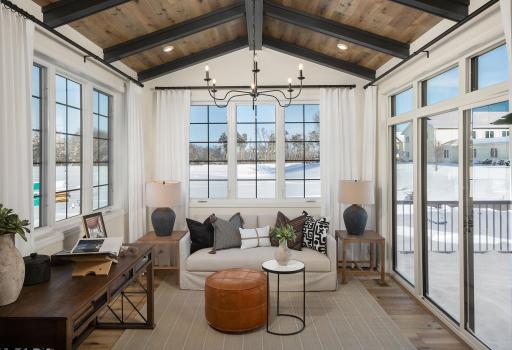Stunning morning room flooded with natural light, creating the perfect spot to relax and take in the day - *Photo of model home, design selections may vary