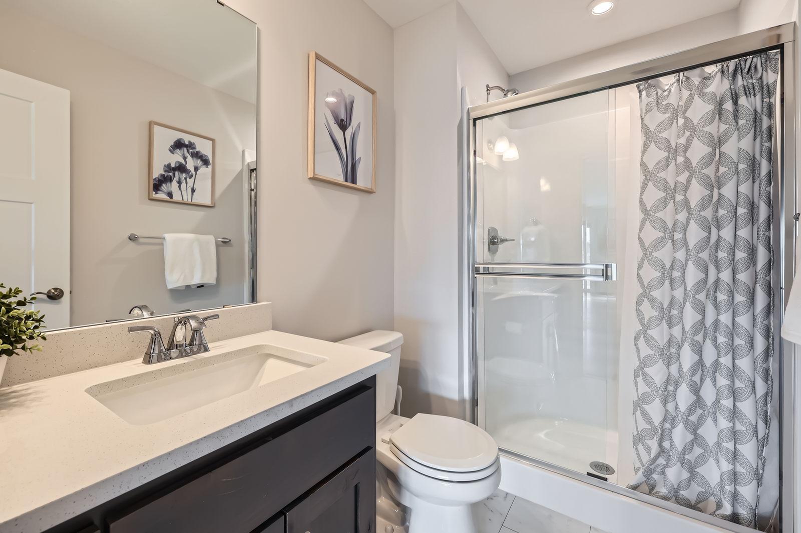 12985 Bauer Dr N - Web Quality - 032 - 53 Lower Level Bathroom.jpg