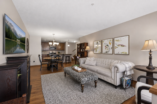 Beautiful LVP flooring throughout the main level, stairs and upper level loft