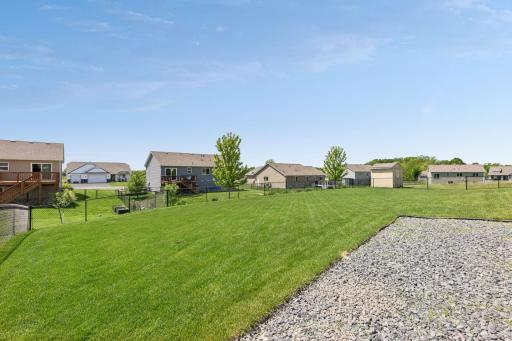 Large, flat lot has an irrigation system in place and a well kept lawn.t