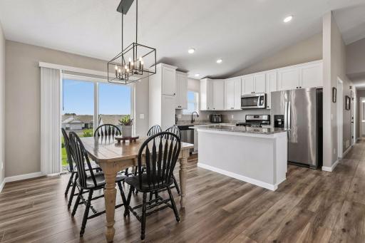 Spacious dining area, easily accommodates a large table and chairs.