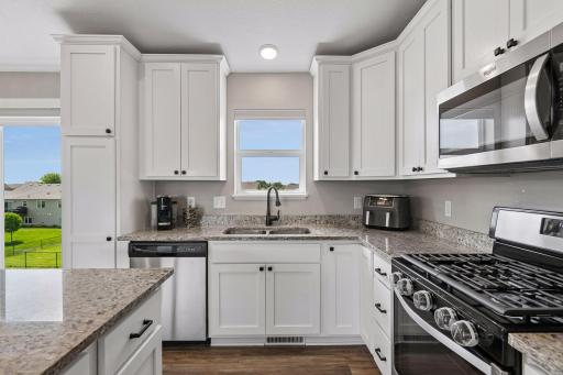 The kitchen is well equipped with all stainless steel appliances.