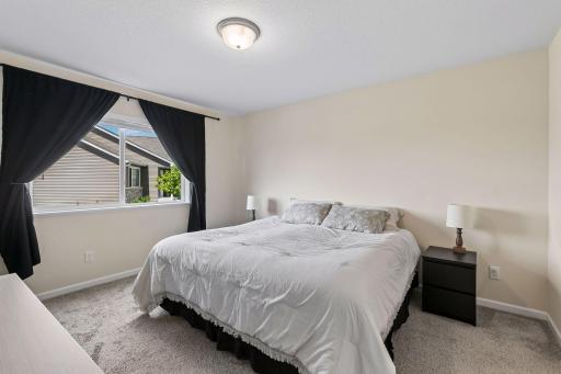 Primary suite early accommodates a king size bed.