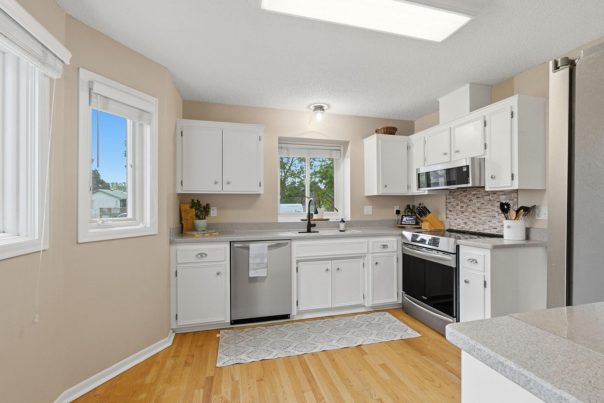 Updated kitchen with newer stainless steel appliances