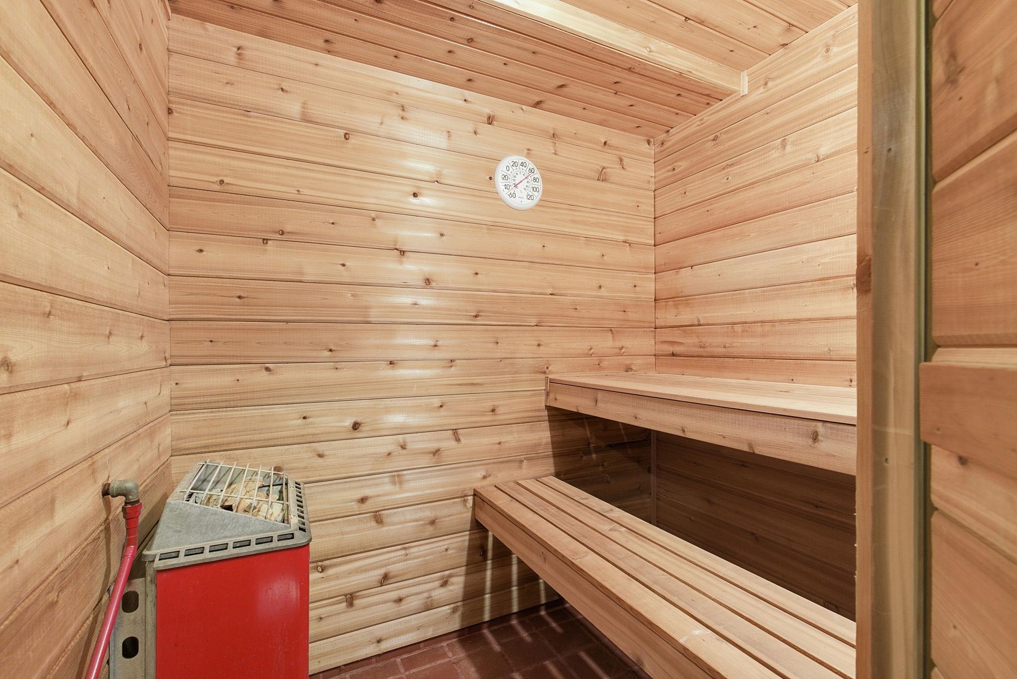 Built in sauna in lower level bathroom