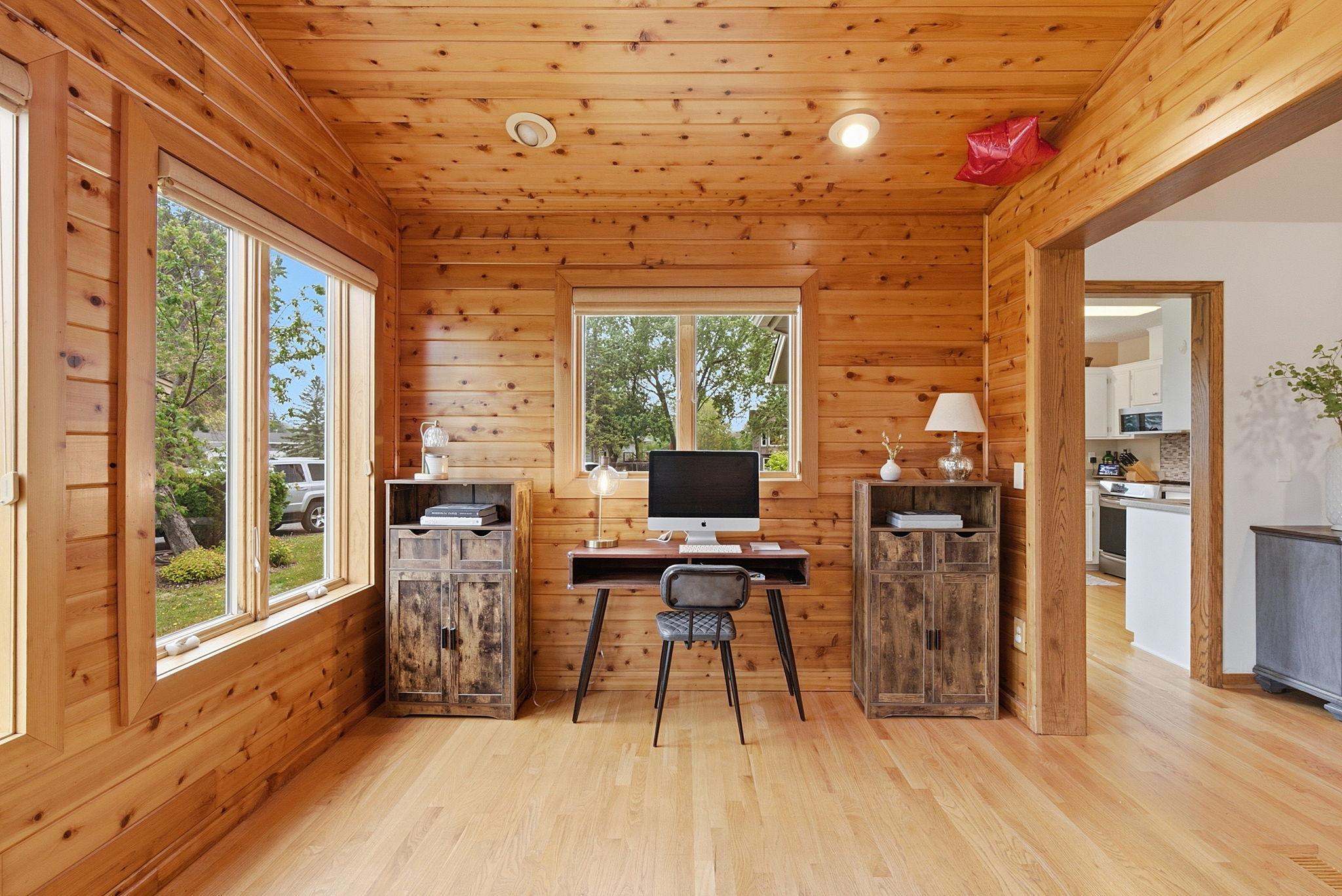 Desk area within the 4 season porch with loads of natural light