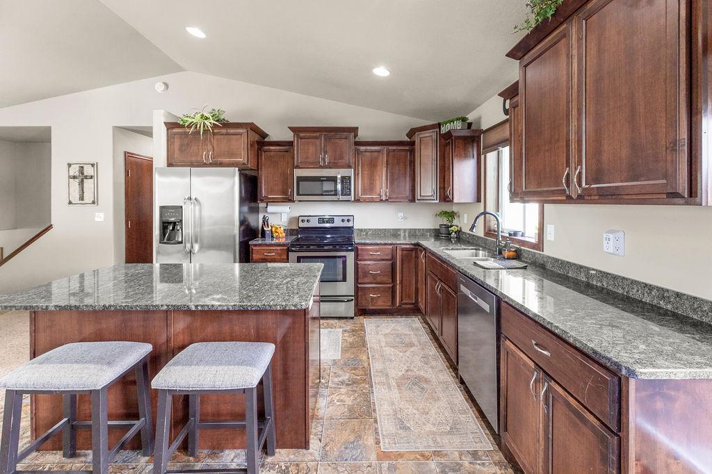 Open-concept living! Great kitchen with tons of cabinets & storage!