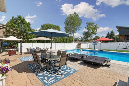 Approximately $200,000 was invested in creating this extraordinary outdoor oasis. From the heated saltwater pool with an auto cover to the expansive entertaining decorative patios, every detail was thoughtfully designed.