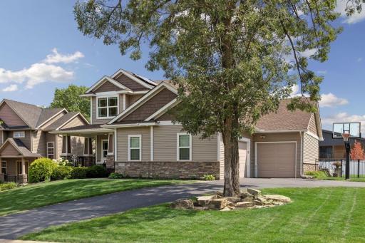 Beautifully maintained inside and out, this exceptional home sits on a manicured homesite with lush landscaping, an oversized driveway, and an attractive three-car garage. Tons of storage in garage. 3rd stall is 28x14, perfect for a boat.